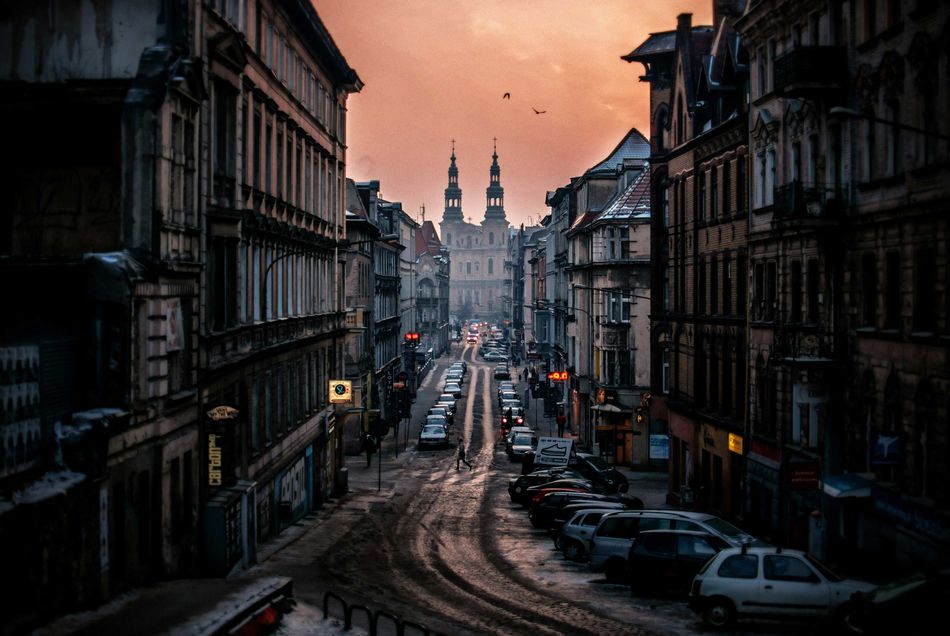 Sunrise over the rooftops of Poznań, Poland, photographed by Erik Witsoe.